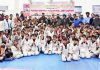 Winning Taekwondo players along with dignitaries posing for a group photograph at Indoor Sports Hall Poonch on Wednesday.