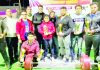 Winners posing for a group photograph along with their trophies at Jammu on Tuesday.