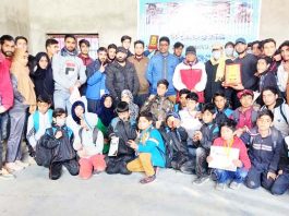 Winning players posing for a group photograph at Budgam.