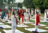 Ladies performing Yoga exercises at a function on 'Mahila Yog Shakti Diwas' in Jammu on Friday.