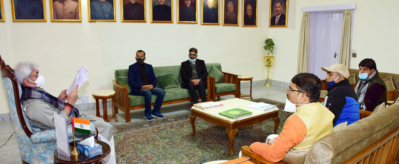 Lt Governor Manoj Sinha chairing a meeting at Jammu on Monday.
