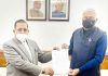 Union Minister Dr. Jitendra Singh receiving a memorandum regarding DoPT issues from Kirori Lal Meena, Member of Parliament (Rajya Sabha) at North Block, New Delhi on Monday.