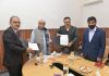 J&K Govt and NAFED officials sign MoU in presence of Lieutenant Governor Manoj Sinha in New Delhi on Friday.