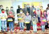 Office bearers of Bhartiya Shiksha Samiti distributing solar lights to needy students at Jammu.