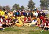 Winning teams posing for a group photograph with chief guest, Dr Saleem-Ur-Rehman during concluding ceremony of Hockey competition at Jammu.