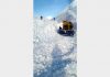 Snow clearance work in progress on Mughal Road in Poonch sector.