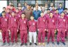 Selected wrestling team posing for group photograph with Divisional Sports Officer Ashok Singh and others at Jammu.