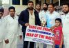 Chief guest Anukul Bhagat presenting man of the match award to a player at MA Stadium Jammu.