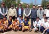 Winning teams posing for a group photograph with chief guest Prof. Subash Sharma Principal GDC Boys Udhampur.