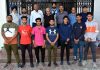 Selected Archery team posing for a group photograph with Divisional Sports Officer at MA Stadium Jammu.