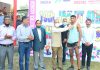 Vice Chancellor Prof Manoj Dhar presenting medals to winner athletes of opening day events at Jammu on Friday