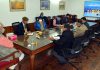 LG Manoj Sinha chairing a meeting in Srinagar on Tuesday.