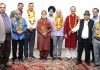 Newly elected team of Shiv Mandir Management Committee Trikuta Nagar posing for a group photograph.
