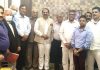 President SAJ Raman Suri and others posing for photograph after meeting.