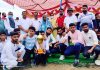 Winning team posing for a group photograph alog with trophy and dignitaries at Kodewala Akhnoor.