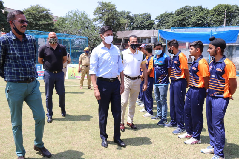 ADGP Mukesh SIngh interacting with team players during inaugural ceremony of 3rd PPCPL at Jammu on Sunday.