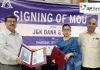 Commissioner JMC Avny Lavasa and J&K Bank officer during signing of MoU.