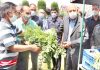 MP Dr Farooq Abdullah during visit to organic vegetable outlet in Lalmandi, Srinagar on Saturday.