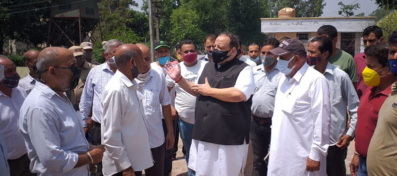 NC Provincial President Devender Singh Rana interacting with people at Kol Kandoli Temple on Wednesday.