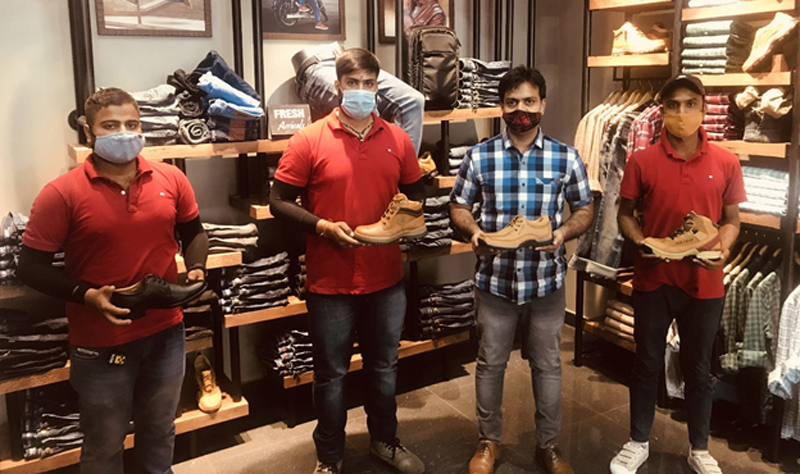 Company executives displaying Red Chief products at its new outlet at Kathua.