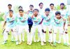 Football players posing for a group photograph during Premier UT League match at Srinagar.