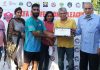 A player being awarded with man of the match award by dignitaries at Srinagar during Football Professional League on Friday.