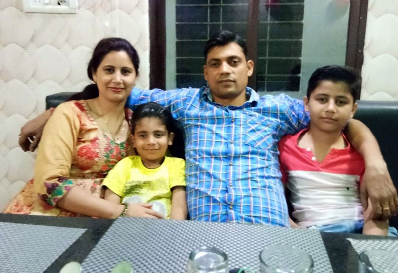 RPF officer Rakesh Kumar along with his wife and two sons.