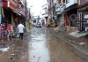 Rain water enters Nanak Nagar on Monday. -Excelsior/Rakesh