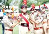 DGP Dilbag Singh decorating a new recruit at PTS Kathua on Friday. -Excelsior/Pradeep Sharma