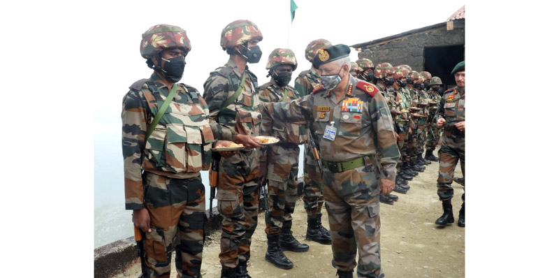 CDS Bipin Rawat interacting with troops during his visit to Kupwara sector along LoC on Tuesday.