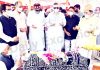 National Conference president Dr Farooq Abdullah, Omar Abdullah and other party leaders offer special prayers for Begum Akbar Jehan on her death anniversary at Hazratbal in Srinagar on Sunday. -Excelsior/Shakeel
