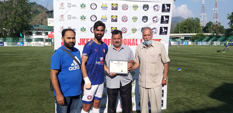 A player being awarded by dignitaries at Srinagar on Tuesday.