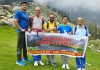 Five members team of Tawi Trekkers posing for a group photograph before starting expedition from Mcleodganj in Himachal Pradesh.