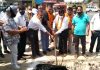Councillor Pritam Singh starting blacktopping work along with prominent citizens in Ward 55 on Thursday.
