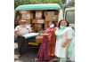 Pradeep Jain of Jainco Hero handing over PPE kits, masks and sanitizers to Dr Indra Bhatyal Medical Superintendent Government Hospital Gandhi Nagar.