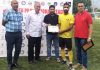 A player being awarded during the Professional Football League by dignitaries at Srinagar on Monday.