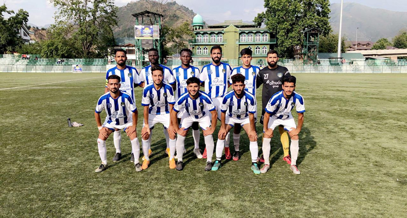 Winning team players posing for a group photograph after the match at Synthetic Turf TRC Ground Srinagar on Wednesday.