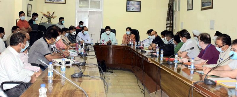 Divisional Commissioner Jammu Raghav Langer chairing a meeting on Monday.