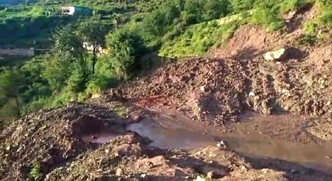 Ramnagar to Basantgarh Road which is lying closed due to landslide.