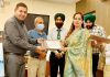 Newly elected president of Rotary Club Jammu Trikuta being awarded with memento by dignitaries in Jammu on Tuesday.