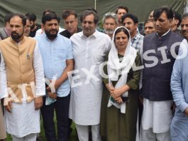 PC chief Sajjad Lone with new entrants to party in Srinagar on Saturday. —Excelsior/Shakeel