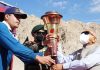 Lt. Governor R K Mathur receiving the Victory Flame at 14 Corps on the occasion of Swarnim Vijay Diwas.