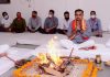 Executives and staff of SMVD Shrine Board along with others performing Havan to celebrate Foundation Day of Board.