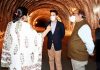 Union Minister for I&B inspecting progress on a tunnel project.