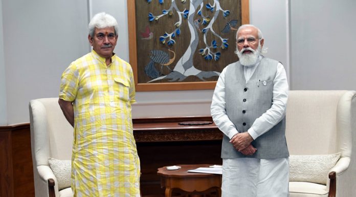 Lieutenant Governor Manoj Sinha in a meeting with Prime Minister Narendra Modi in New Delhi on Thursday. Another pic on page 4.