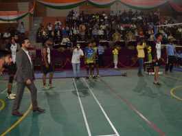 Sports Minister Anurag Thakur participating in Volleyball match at Budgam on Monday.