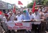 Farmers led by (CPI-M) leader, MY Tarigami staging protest near Press Club in Jammu on Monday. -Excelsior/Rakesh