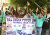 Porters of Kargil war staging protest near Press Club in Jammu on Sunday. —Excelsior/ Rakesh