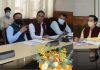 CS, AK Mehta chairing a meeting at Srinagar.