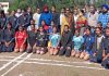 Participants of the Kho-Kho championship posing a group photograph along with dignitaries at Kathua.